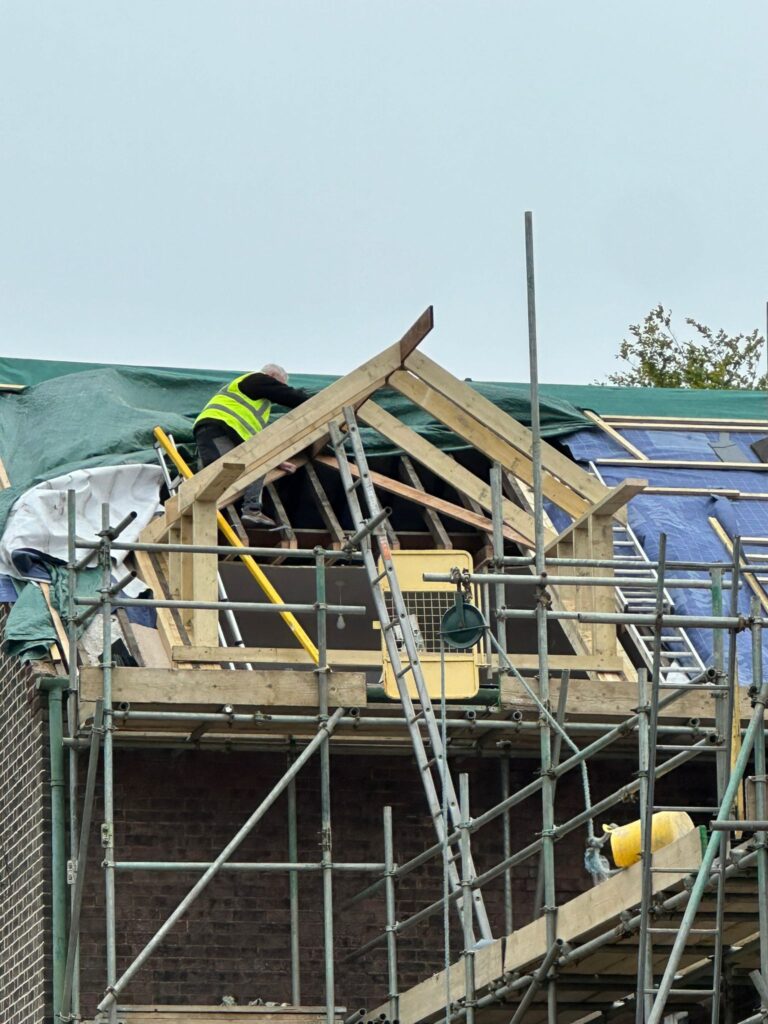 Builders working on a new dormer extension